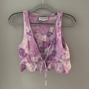 purple floral tie in the front top from Charlie Holiday. It is a size xs.